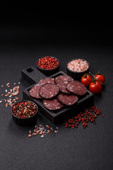 Black blood pudding, grilled pork sausage cooked for dinner. Blood pudding