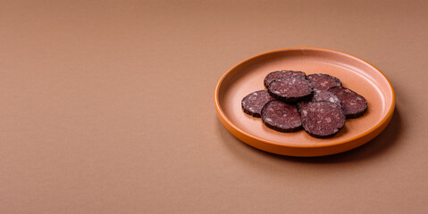 Black blood pudding, grilled pork sausage cooked for dinner. Blood pudding