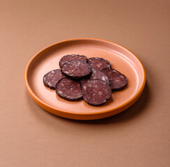 Black blood pudding, grilled pork sausage cooked for dinner. Blood pudding