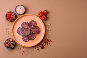 Black blood pudding, grilled pork sausage cooked for dinner. Blood pudding