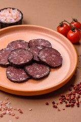 Black blood pudding, grilled pork sausage cooked for dinner. Blood pudding