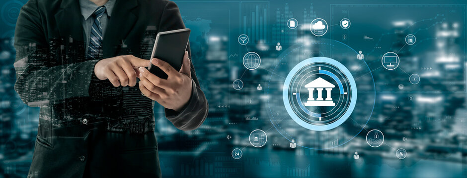 A global FinTech and digital banking network technology concept. A central financial system connected to the worldwide digital economy and services. Motif - Powered by Adobe