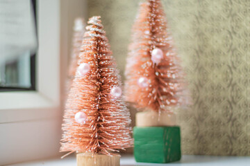 A toy Christmas tree in a soft retro filter, horizontal shot