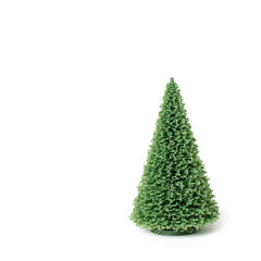A small green decorative Christmas tree standing against a clean white background, creating a simple and modern holiday aesthetic.