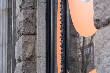 Artistic blend of stone and glass on a city street