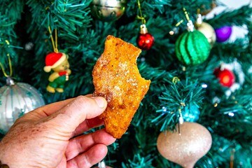 Golden Fried Christmas Dessert with Powdered Sugar, know as rabanadas de Natal