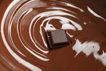 Tasty melted chocolate and piece as background, closeup