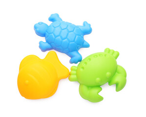 Bright children's beach toys isolated on white, top view