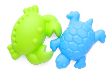 Bright children's beach toys isolated on white, top view