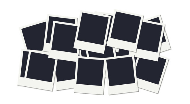 A pile of blank polaroid photos.