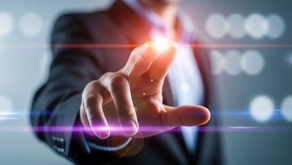 A businessman's hand reaching out to touch a glowing, futuristic digital interface with abstract lights in a modern setting.