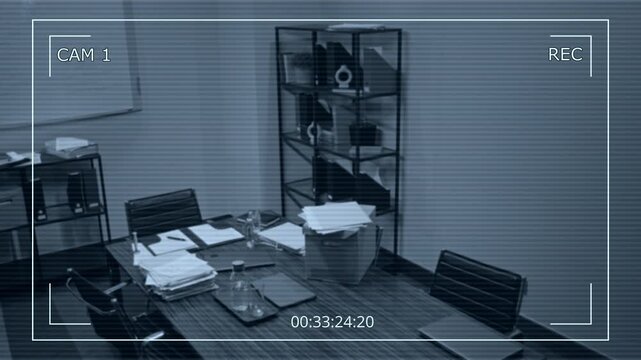 Wide high-angle security camera CCTV shot of meeting room at law firm before meeting of attorneys, with piles of paperwork, evidence, case files, laptop and tablet lying on table