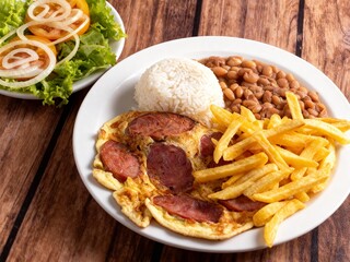 Omelet stuffed with Calabrese sausage and fries