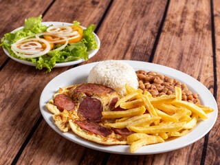 Omelet stuffed with Calabrese sausage and fries