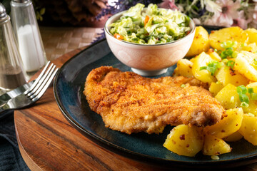 Pork chop with potatoes.