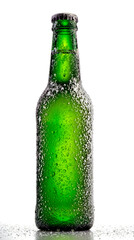 A green glass bottle with condensation droplets on it