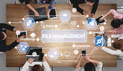 A dynamic overhead view of a collaborative workspace showcasing file management concepts with technology icons related to cloud storage, backup, and compression tasks. Tessel