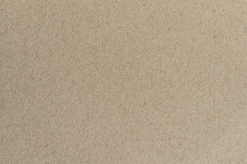 Texture of brown paper on a flat surface in natural light