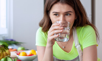 young woman drinking water