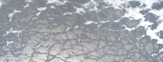 Panorama of puffy white summer clouds with the blue sky transparent