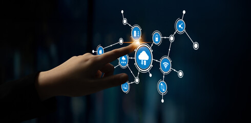 A hand interacts with a digital interface displaying cloud computing icons and data connections, illustrating modern technology and information exchange themes. Tessel