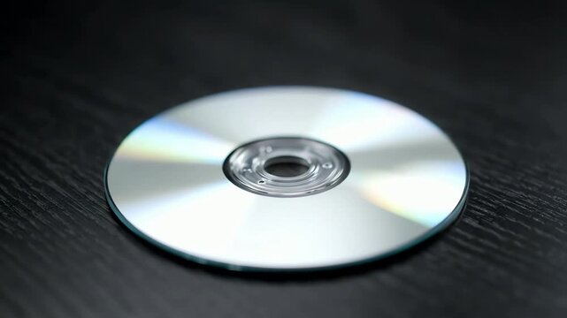 A compact disc with a glitchy corrupted sound effect representing obsolete technology and data loss.