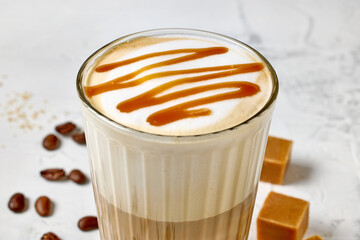 closeup of caramel latte coffee glass