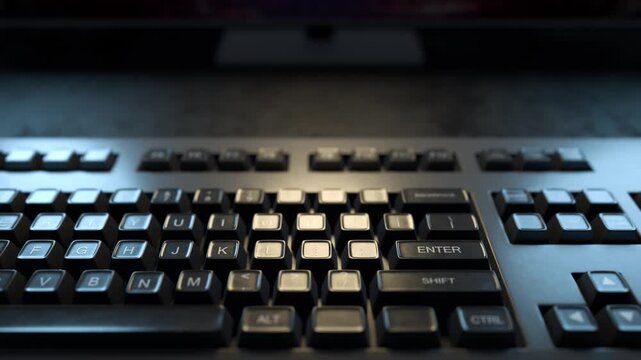 Pressing the enter key. Working on a computer. Blogging. The keyboard key is pressed. The camera moves along the keyboard. Hacking. Virus. Hacking a computer. Hacker attack. Typing. Remote work.