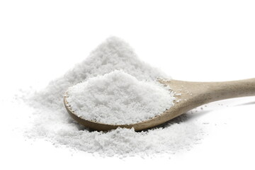 Pile of shredded coconut meat in wooden spoon isolated on white background, side view