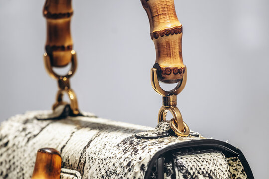 Nice, France - August 2, 2025: Iconic Gucci Bamboo handbag displayed in a luxury fashion store window, featuring the signature bamboo handle and textured leather design