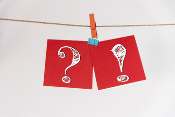 The combination of symbols (?!)  to represent Curiosity and Surprise; A photo featuring two red...