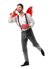 Obraz premium Man dressed as Cupid talking by phone on white background. Valentine's Day celebration
