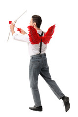 Obraz premium Man dressed as Cupid with bow and arrow on white background. Valentine's Day celebration