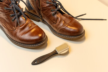 Cleaning Brown Leather Shoes with Brush – Footwear Care, Shoe Maintenance and Polishing at Home, Mens Style and Grooming Concept