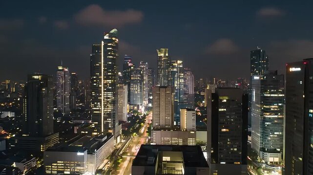 jakarta city skyline at night with illuminated skyscrapers and busy traffic time lapse modern asian business district background