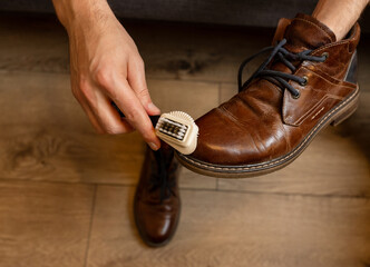 Cleaning Brown Leather Shoes with Brush – Footwear Care, Shoe Maintenance and Polishing at Home, Mens Style and Grooming Concept