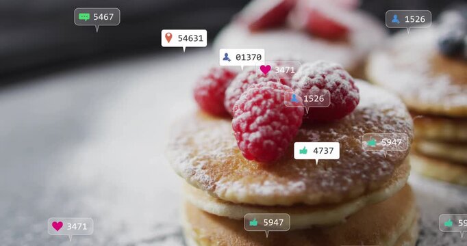 Sugar dust falling top-left badges growing around mini pancakes with raspberries showing likes rise