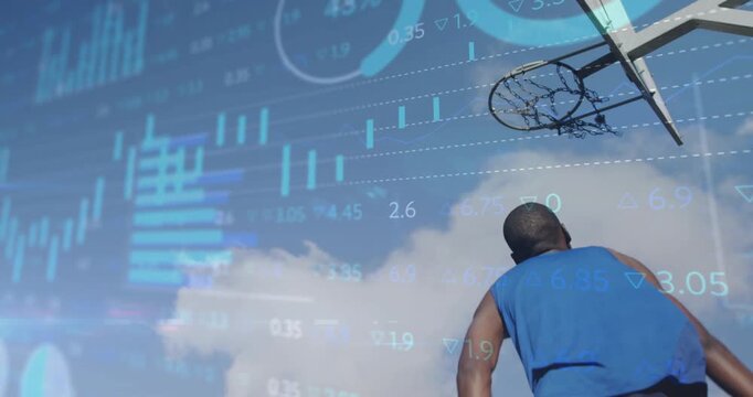 Male athlete jumping, launching dunk on takeoff for score, financial candlestick bars around player