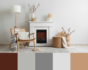 Obraz premium Fireplace, armchair, wicker basket and vases with cotton flowers in interior of living room. Different color patterns