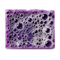 Close up of a purple sponge covered in white soap bubbles and suds