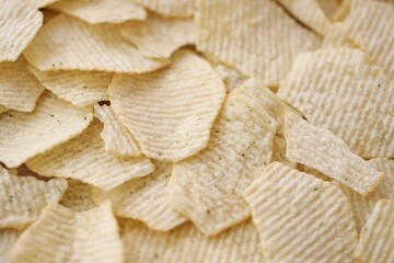 Homemade Flavored Paprika Potato Chips in a Bowl, top view. Flat lay