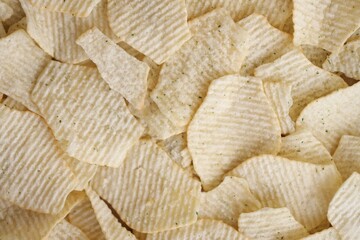 Homemade Flavored Paprika Potato Chips in a Bowl, top view. Flat lay