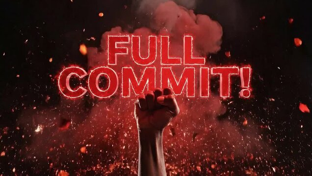 Full commit text in fire with raised fist and explosion