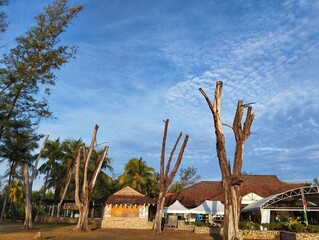 Scattered white clouds with blue sky background.