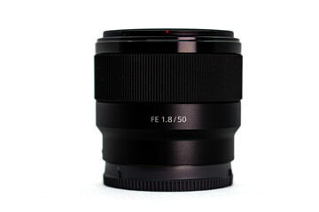 50mm f1.8 camera lens isolated on white background with professional photography concept