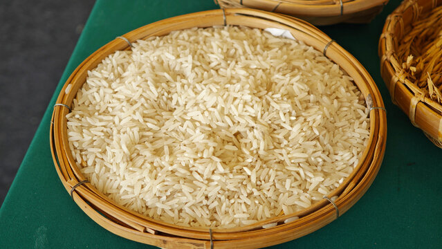 White rice in a winnowing basket.