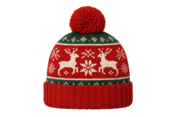Knitted christmas pompom hat featuring reindeer and snowflake pattern in red, green, and white for winter holiday season