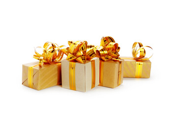 Golden ribbons  and Red color Christmas Gift Box white and golden lighting blur background