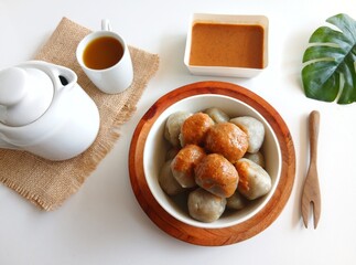 Cilok is a traditional food from Bandung, West Java, Indonesia. This food made from tapioca flour and serve with spicy peanut sauce