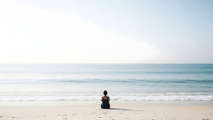 Serene Beach Scene A Person Meditates by the Ocean, Embracing Tranquility and Inner Peace